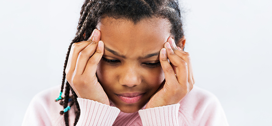 Headaches are typical in children, so when should you call the pediatrician?