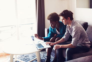 Couple using computer